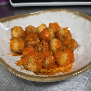 Queso empanado con mermelada