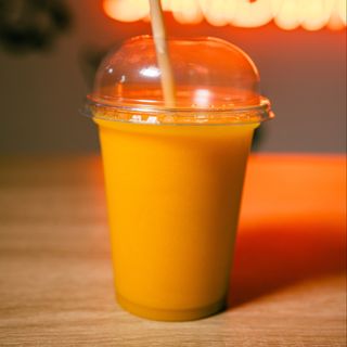 Zumo de mango en leche