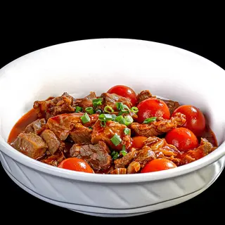 Entraña Salteada Con tomate cherry.