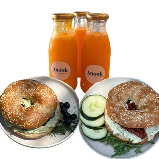 2 x bagel, 2 x orange juice + water