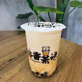 Jazmín con leche y tapioca de azúcar moreno.