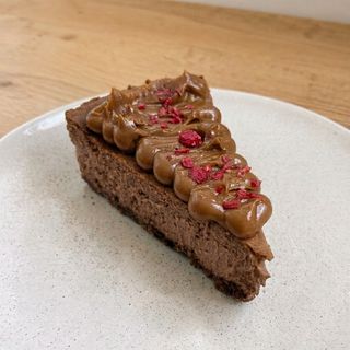 Tarta De Queso Con Chocolate Y Dulce De Leche (Porción)