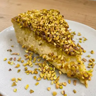 Tarta De Queso Con Pistacho (Porción)