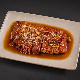 Pato Caramelizado Con Semillas De Sésamo