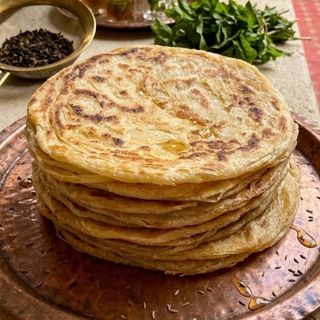 Meloui con miel y mantequilla