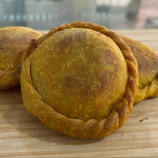Empanadita de pollo curcuma
