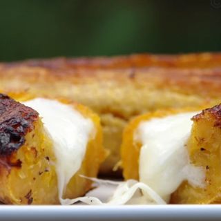 Porción de maduro con queso