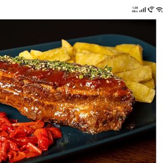 Costilla Asada A Baja Temperatura Con Patatas Y Piquillos