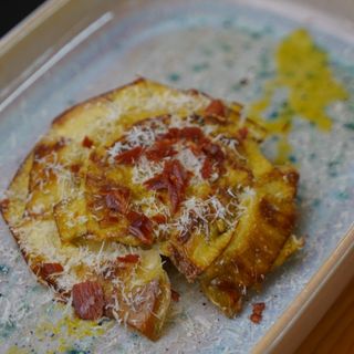 Alcachofa Confitada Con Crujiente De Jamón Y Queso Parmesano (Unidad)