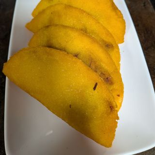 Empanada venezolana de Pollo (1 Ud.).