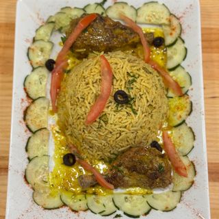 Arroz Con Muslos De Pollo