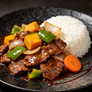 Arroz blanco con ternera