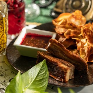 Crispy Pork with Mango salsa & Cherry Sauce