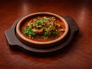 ხბოს ჩაშუშული პომიდორში