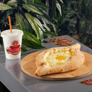 1 აჭარული ხაჭაპური და ლაღიძის წყალი 0.5 ლ