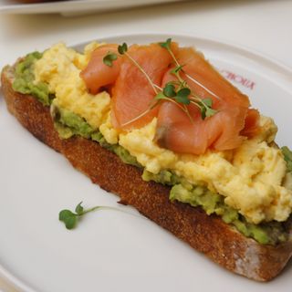 Avocado toast with scrambled egg and salmon