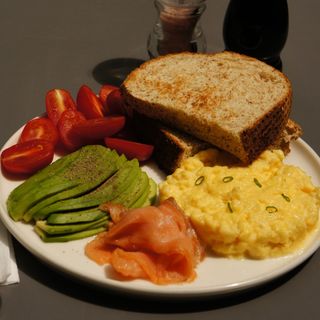 Scrambled egg with avocado and salmon