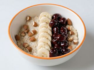 Oatmeal with jam and seasonal fruits in milk and butter 300gr