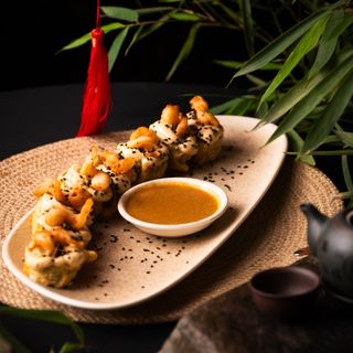 Tempura roll with shrimp and kimchi tom yum sauce
