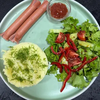 Sausages with puree and salad