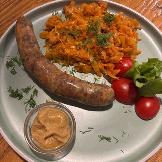 Homemade sausage with stewed cabbage