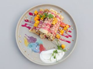 Crepes with pink condensed milk and seasonal fruits