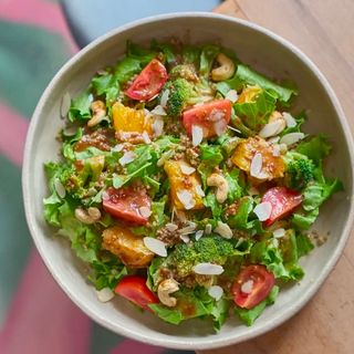 Light salad with quinoa, broccoli, and orange