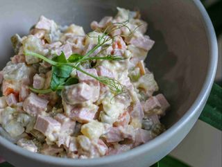 Olivie with boiled sausage