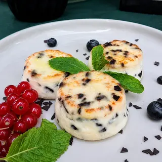 Syrniki with dark chocolate