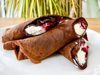 Chocolate crepes with cherries and curd mousse