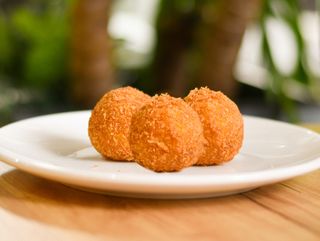 Crispy potato balls with cheese