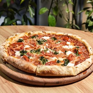 Pizza with feta and spinach