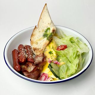 French omelette with bacon and hunter sausages