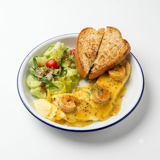 French omelette with shrimps and hollandaise sauce
