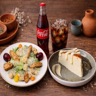 Classic Caesar Salad, San Sebastian Cheesecake and Coca-Cola