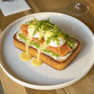 Eggs Benedict with salmon and avocado