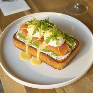 Eggs Benedict with salmon and avocado