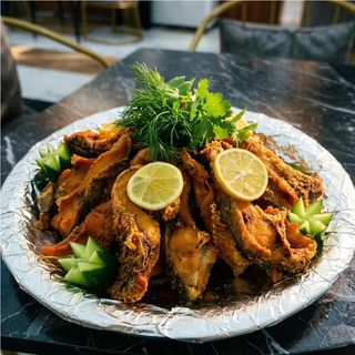 Жареные рыба на сковородке