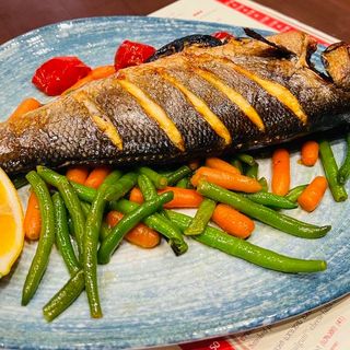 Sibas with vegetable garnish