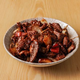 Tagliatelle di riso in salsa tausi.