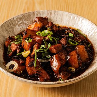 Pancetta stufata alla canna da zucchero 