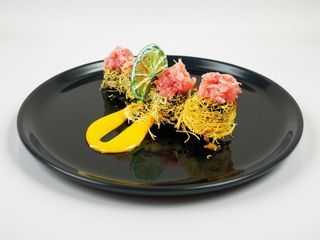 174. Uramaki di Nidi tonno (4 Pezzi)