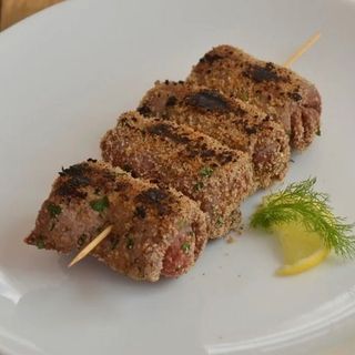 spiediniìo di maiale  con condimento siciliano