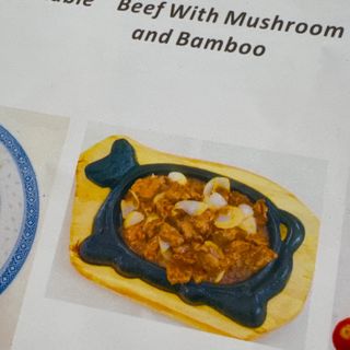 68A manzo con cipolla