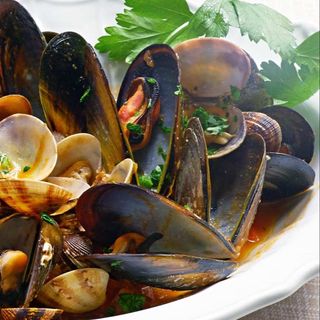 Impepata di cozze con olio e limone