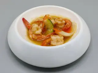 54. Gamberi al curry