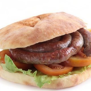 Puccia con zampina, pomodoro rucola e grana 