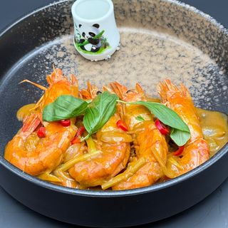 T 6. Gamberoni in latte di cocco con curry verde tailandese