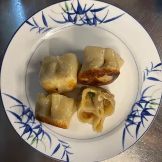 Ravioli con gamberi alla griglia