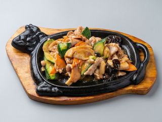 Maiale alla piastra con verdure